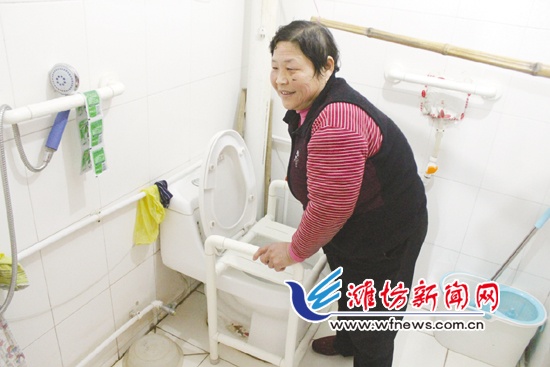 潍坊对贫困残疾人家庭进行了无障碍设施改造 