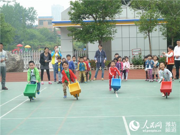 潍坊高新双语学校幼儿园举行2015春季亲子趣